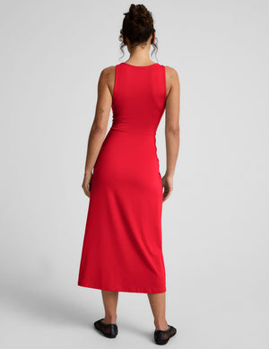 red square neck midi length dress with a front side slit. 