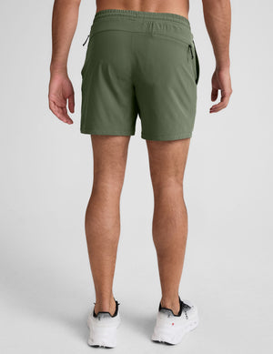 Back view of olive Pivotal 2.0 Men's Lined Short 7