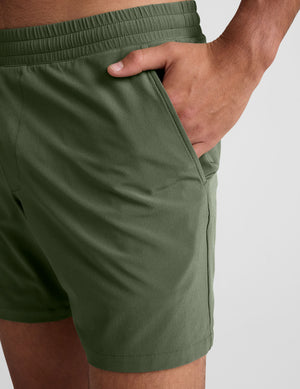 Close-up of olive Pivotal 2.0 Men's Lined Short 7