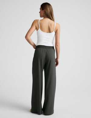 Rear view of a model wearing dark green wide-leg Elasticated Trouser Pant 31