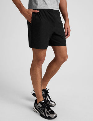 Black marled Spacedye Unlimited Men's Short featuring a relaxed fit, elastic waistband, and side zippered hand pockets.